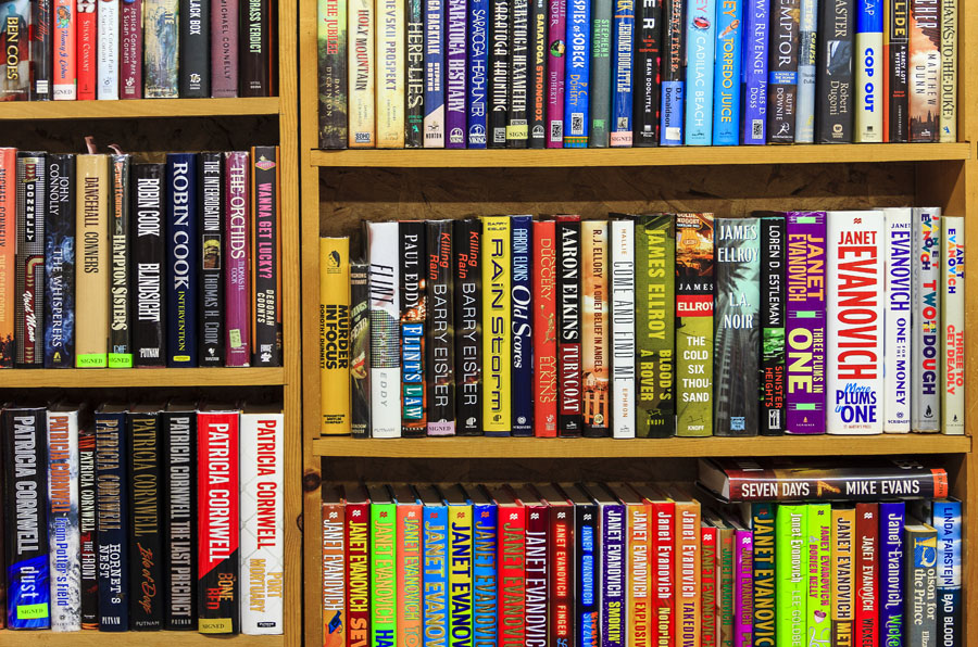 Books line shelves inside Books End bookstore in Syracuse, New York.