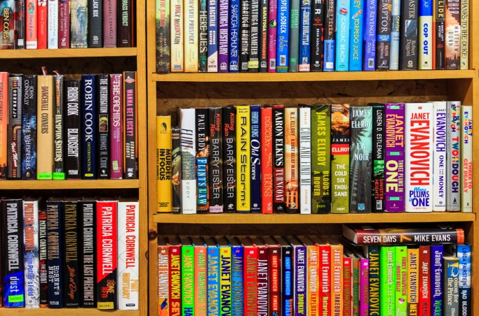 Books line shelves inside Books End bookstore in Syracuse, New York.